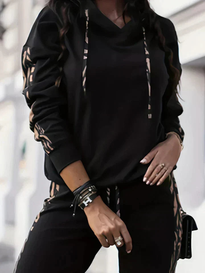 Women's Hooded Two-Piece Tracksuit Set with Printed Sleeve and Trouser Detailing – Relaxed Fit Pullover Sweatshirt and Tapered Joggers for Casual Everyday Streetwear and Comfortable Autumn Winter Outfits