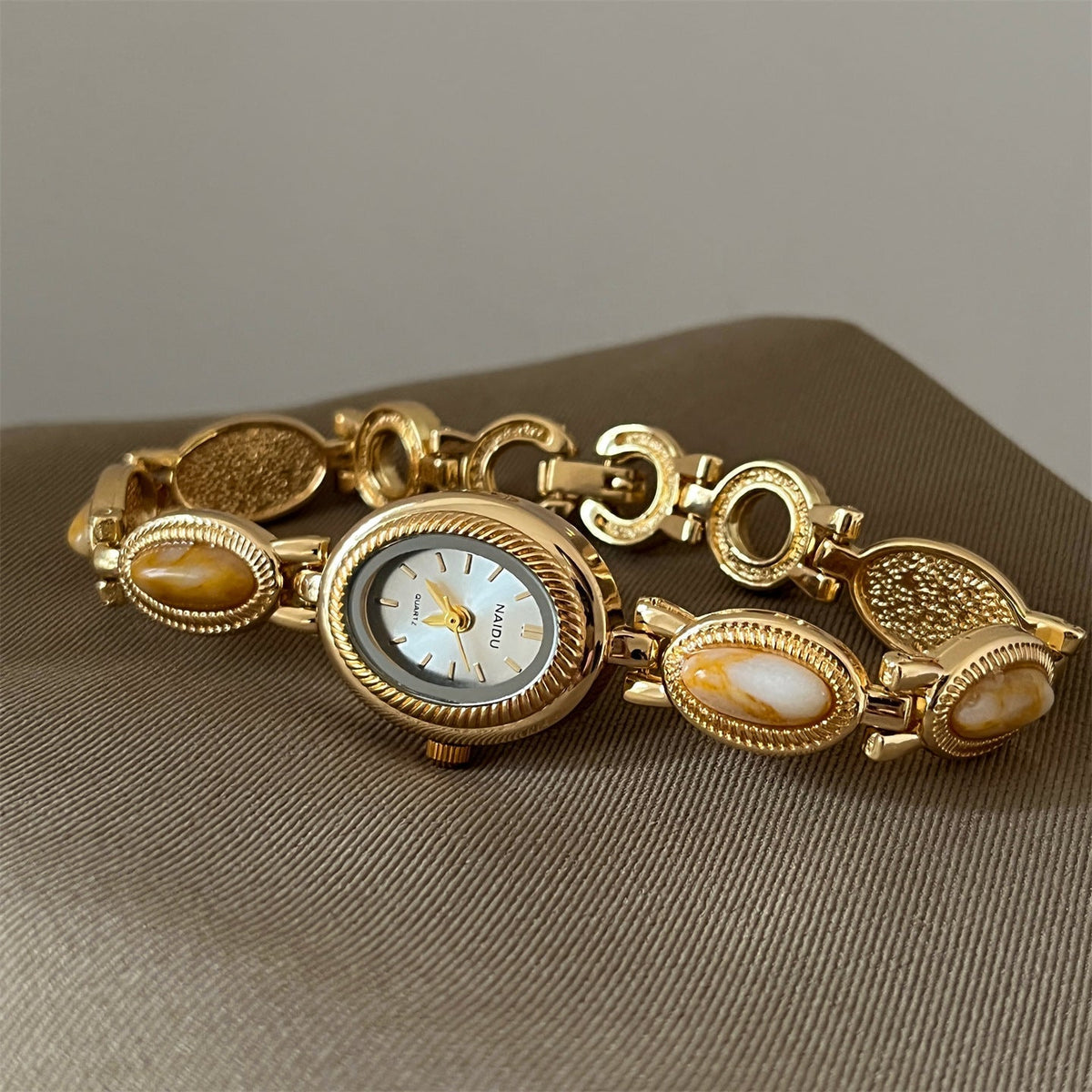 Alviera Women's Watch with Oval Center Case and Stone-Set Link Bracelet