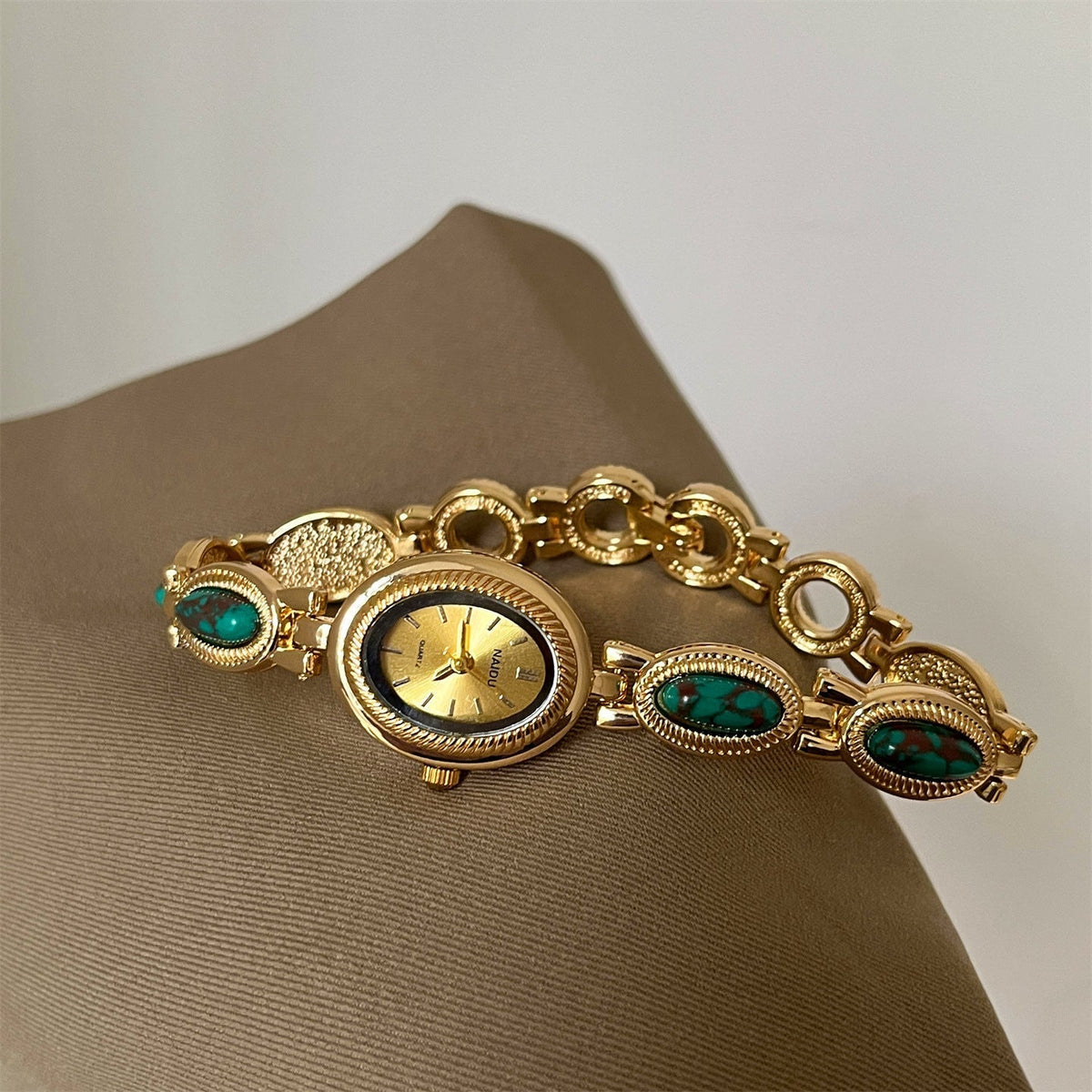 Alviera Women's Watch with Oval Center Case and Stone-Set Link Bracelet