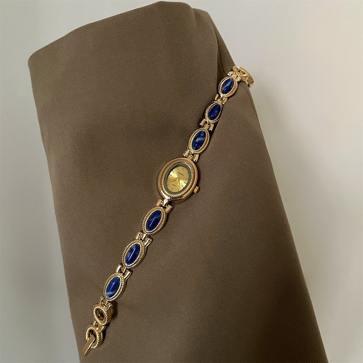 Alviera Women's Watch with Oval Center Case and Stone-Set Link Bracelet
