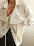 Women’s Button-Front Shirt with Pleated Statement Cuffs – Relaxed Long-Sleeved Design for Work and Elegant Evening Styling