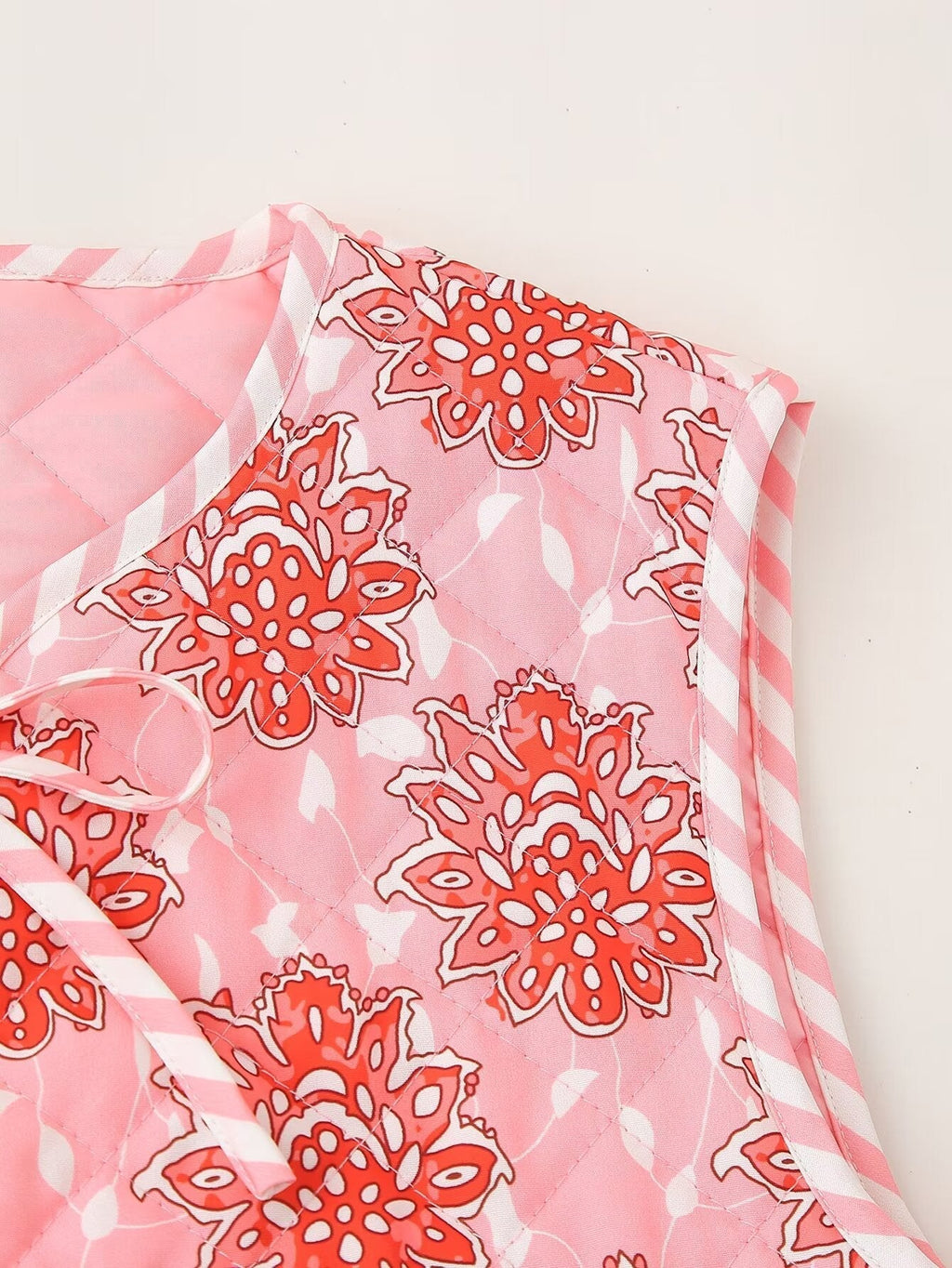 Quilted Vest with Floral Print and Tie Details