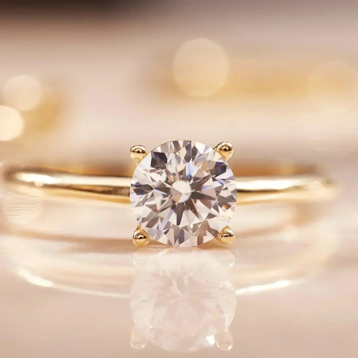 Gold Solitaire Ring with Brilliant-Cut Zircon - Fiorenza