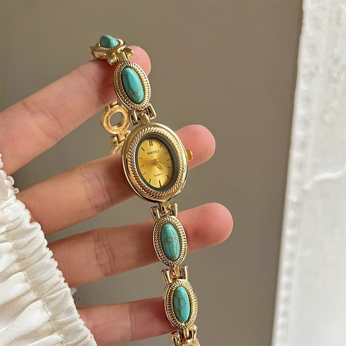 Alviera Women's Watch with Oval Center Case and Stone-Set Link Bracelet