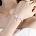 Dream Charm Bangle with Sculpted Details - Ismena