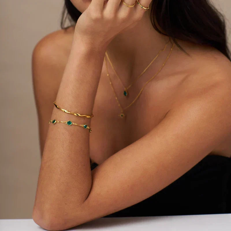 Gold-Tone Bracelet with Round Green Stones - Elviana